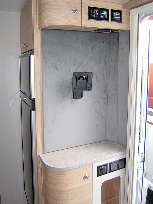 View of the fridge interior - with freezer top box.